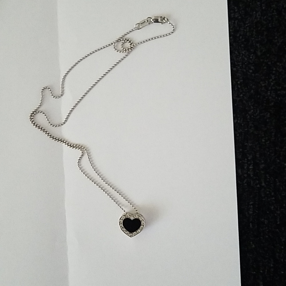 14kt white gold black onyx and diamond heart